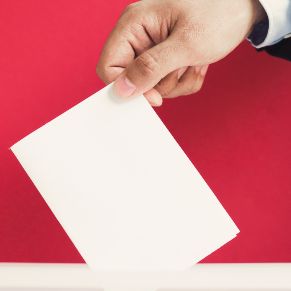 man-putting-an-empty-ballot-in-box-mock-up (3)